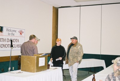 Mike Anderson & Aron Anderson (14yr) 5th place with 3 coyotes.jpg